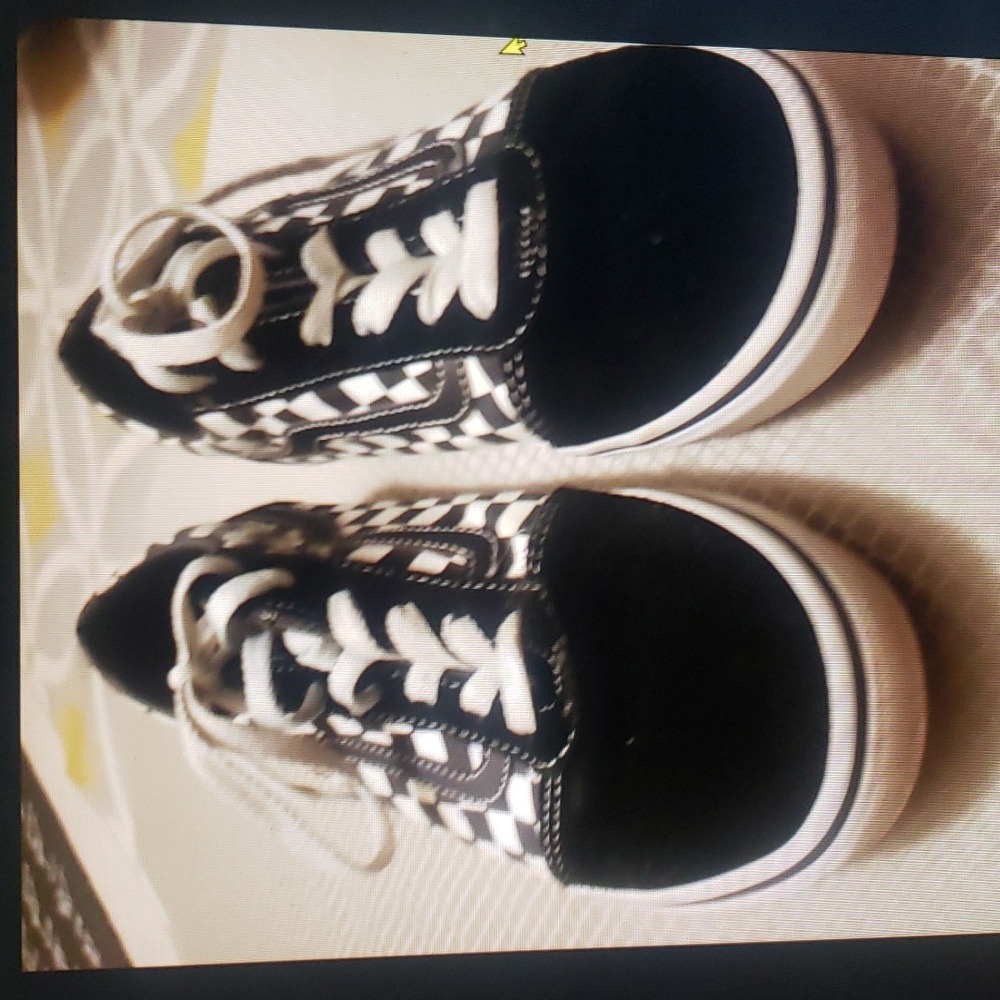 Vans with black & white checker on the sides